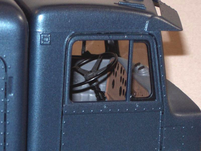 Peterbilt 395 cab interior including dashboard and steering wheel