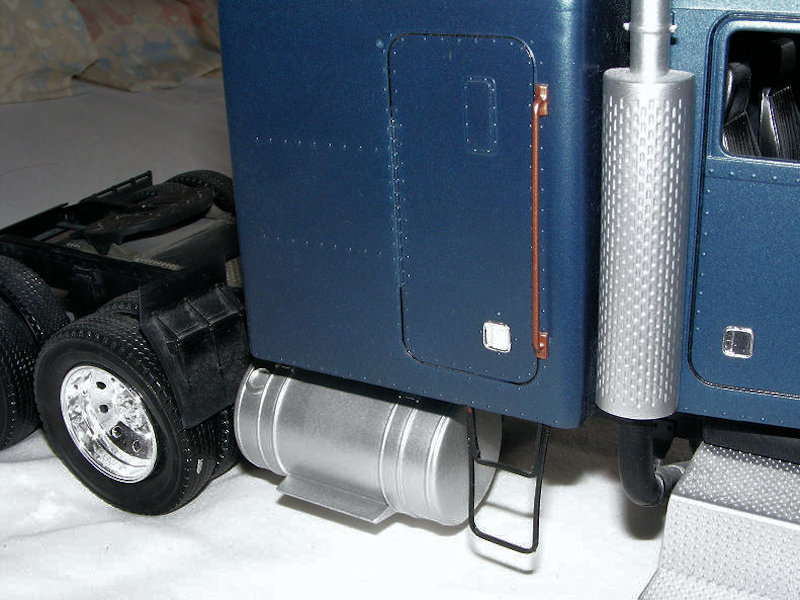 Peterbilt 395 side grab rails and steps fitted
